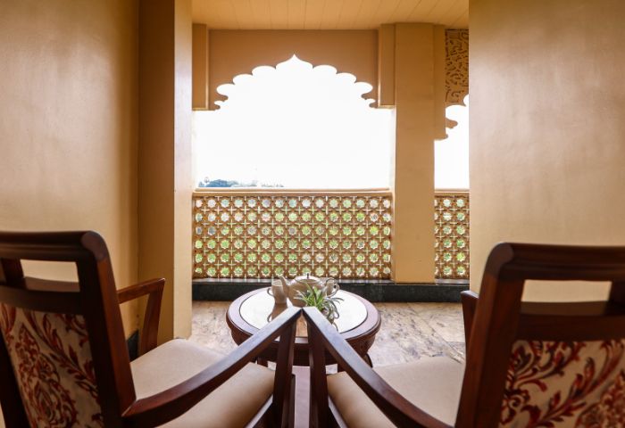 Full room view, balcony access