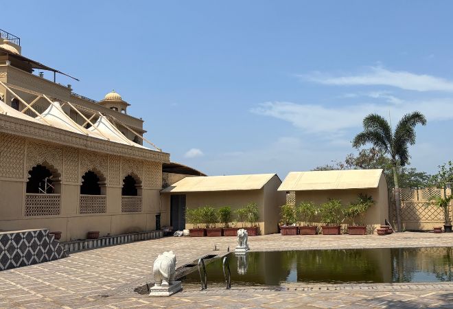 Swimming pool area at resort near Mumbai Thane highway